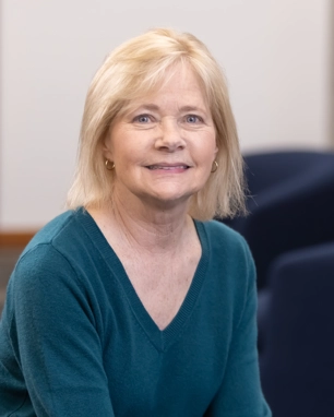smiling person in business attire